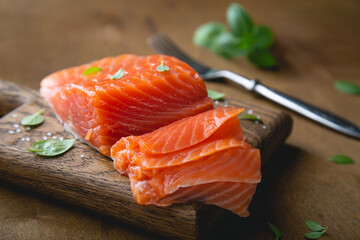 A piece of smoked salmon, cut into thin slices