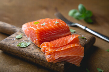 A piece of smoked salmon, cut into thin slices