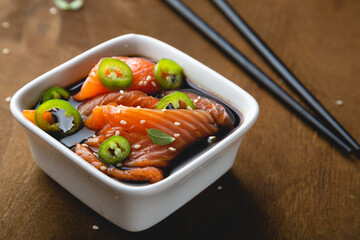 Pickled pieces of salmon on the table