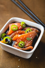 Pickled pieces of salmon on the table