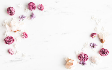 Flowers composition. White and purple flowers on marble background. Flat lay, top view - 456727301