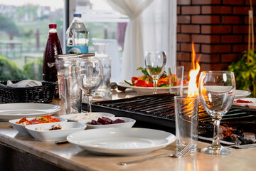 Different types of meat grilled on Barbecue on the table, Served with special Turkish appetizers and Turkish raki.