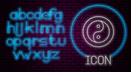 Glowing neon line Yin Yang symbol of harmony and balance icon isolated on brick wall background. Neon light alphabet. Vector