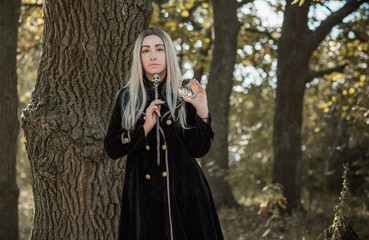 Mystical Halloween party and masquerade ideas, people outfits, scene in the forest