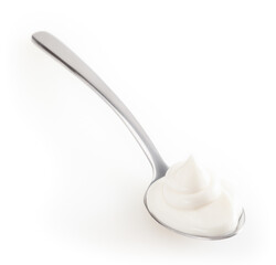 Spoon of mayonnaise isolated on white background with clipping path