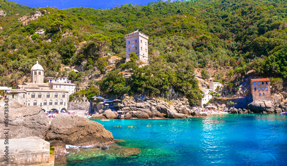 Poster best beaches of italy - scenic small beach and san fruttoso monastery (abbey), popular tourist desti