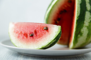 Waterelon, honey watermelon on wooden table background.