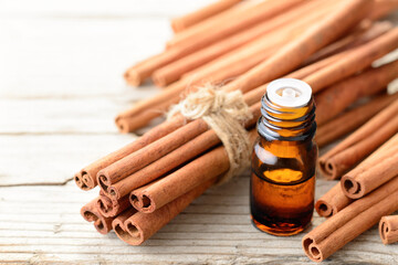 cinnamon essential oil in the glass bottle