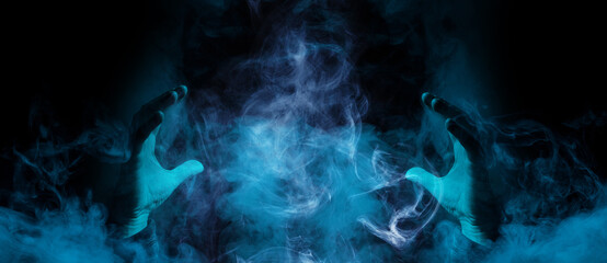 Crystal sphere with mystical smoke in hands. Mysterious composition. Fortune teller, mind power, prediction, halloween concept. Wide angle horizontal wallpaper or web banner. Mockup for your logo. © KDdesignphoto
