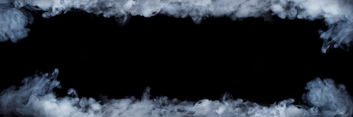 Panoramic view of the abstract fog. White cloudiness, mist or smog moves on black background....