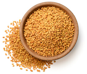 raw fenugreek seeds isolated on white, top view