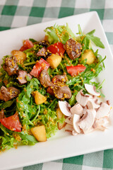 Salad with beef, tomatoes, fresh lettuce salad and arugula, raw mushrooms and great dressing from dijon mustard.
