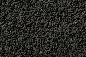 food background of kalonji seeds, top view
