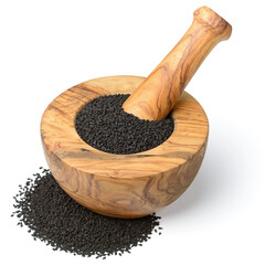 kalonji seeds in the wooden mortar, isolated on the white background