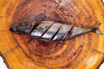 Sliced fresh salmon on a chopping board. 