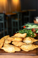 Traditional Romania, Ukrainian, Russian and Tatar food cheburek with meat and spring onion.