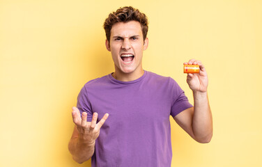 looking angry, annoyed and frustrated screaming wtf or what’s wrong with you. battery concept
