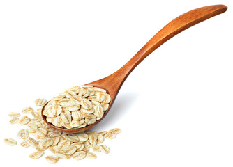 uncooked oatmeal in the wooden spoon, isolated on white