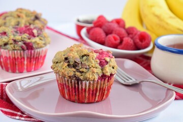 Homemade raspberry banana chocolate chip muffins. Selective focus