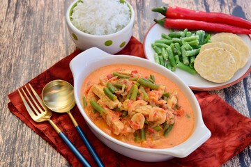 Sayur tempe buncis. Tempeh and green bean cooked in spices and coconut milk. Indonesian food. Served with rice