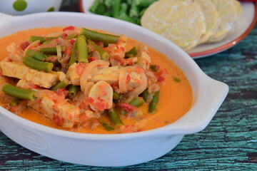 Sayur tempe buncis. Tempeh and green bean cooked in spices and coconut milk. 