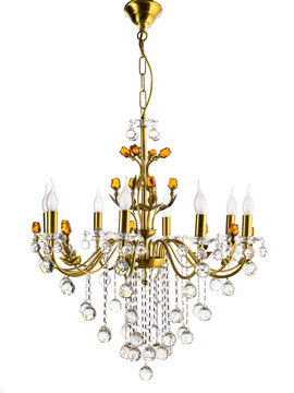 yellow gold chandelier with decorations hanging on a white background