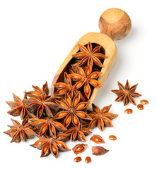 star anise fruits in the wooden scoop, isolated on the white background
