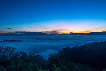 Fototapeta na wymiar Amazing scenery Nature landscape nature view Aerial view drone camera photography of Mist or fog flowing on Mountain peak in the morning sunrise or sunset At Khao Khai Nui Phang Nga Thailand