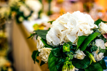Flowers in a vase for the wedding ceremony