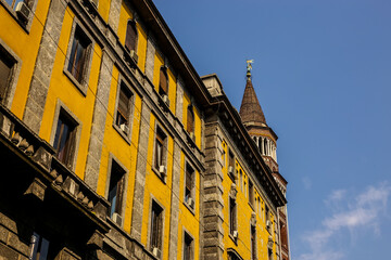 View of Traditional Old Building and Church of Saint Gottardo in Corte on a Sunny Day
