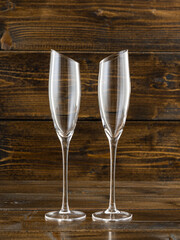 wine glasses with beveled edges on dark wooden background