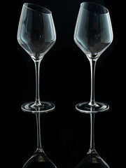 wine glasses with beveled edges on black background