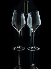 wine glasses with beveled edges on black background