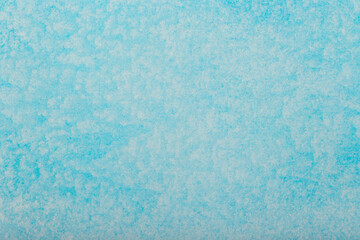 Watercolor background. Blue brush strokes of watercolor paint on white paper.