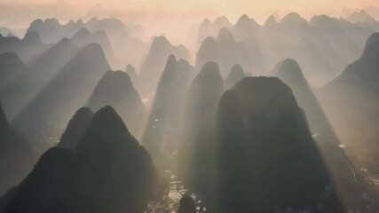 Beautiful aerial view at sunset of Guilin landscape, Li river and karst mountains. Located near Yangshuo County, Guilin City, Guangxi Province, China.