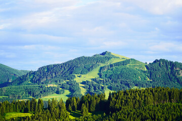 Panorama landscape in the Allg&auml;u in Bavaria. Nature with mountains, meadows and forests.