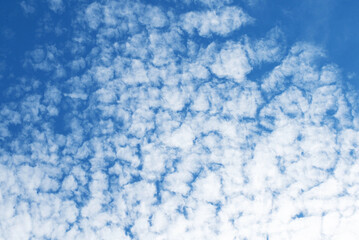 Clean blue sky and white clouds sky background with space for decoration. And used to make wallpaper or bring to work in graphic design..