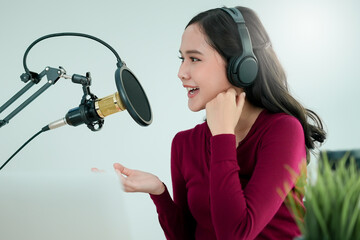 content creator occupation concept. Woman record audio in-home office by condenser microphone