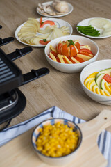 Presentation of ingredients for making raclette