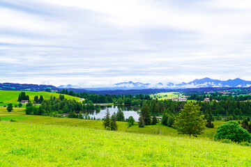 Panorama landscape in the Allg&auml;u in Bavaria. Nature with mountains, meadows and forests.