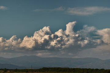 cumulus clouds over the Sierra de Guadarrama National Park. Madrid's community. Spain