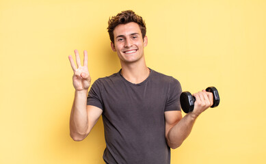 smiling and looking friendly, showing number three or third with hand forward, counting down....