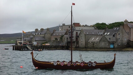 A modern replica of a Viking ship in the harbor, Lerwick,  Shetland, Scotland   