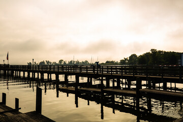 Jetty on Ammersee, foggy day, landscape