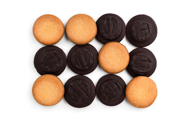 Pile of chocolate biscuit cookies with orange jam isolated on white background.