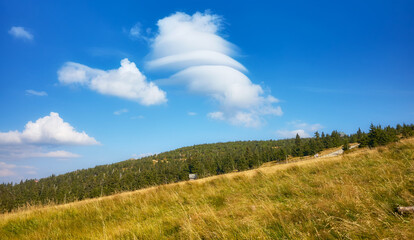 Scenic clouds over Karkonosze Mountains, Karkonosze National Park, Poland.