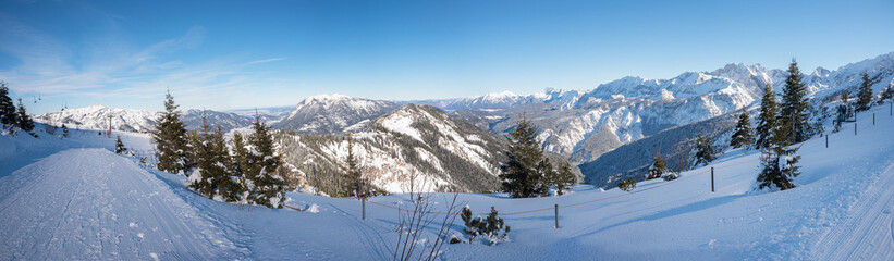 Fototapeta na wymiar wintry hiking route Kreuzeck, tourist resort Garmisch with view to the alps