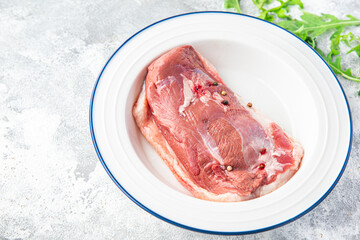 raw duck breast poultry meat fresh portion ready to eat meal snack on the table copy space food background rustic. top view keto or paleo diet