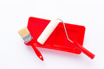 Paint roller and tray  at white background. Construction tool