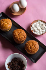 Close up of butter muffins on a tray. Close up, selective focus.